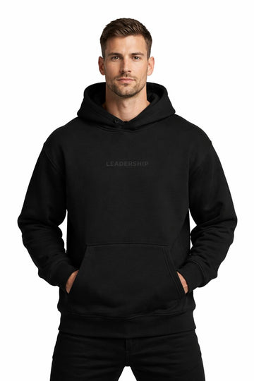 Strong model wearing PLAYAAS CULTURE® Leadership hoodie in minimalist white and black colorways, front and back views on clean white background.