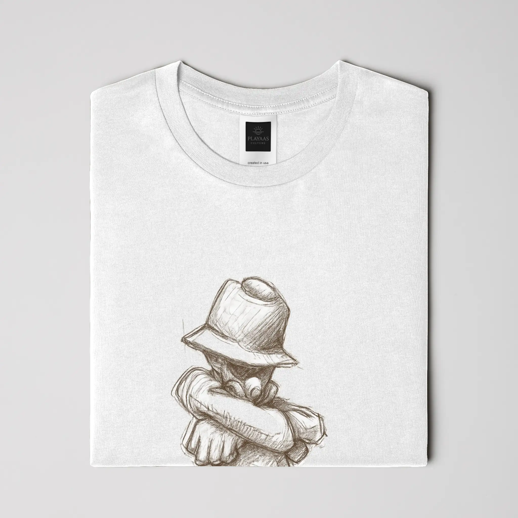 White graphic t-shirt featuring a hand-drawn pencil sketch of a confident figure wearing a bucket hat with arms crossed, printed on a premium cotton tee.