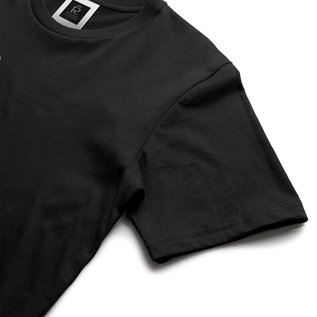 Black streetwear t-shirt featuring small gold crest logo on upper back, minimalist premium design