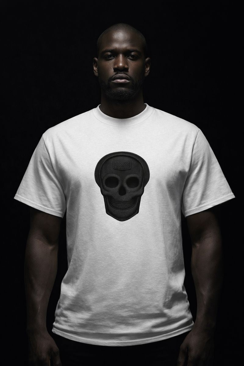Luxury streetwear T-shirt featuring skull front graphic and dripped cross back design. PLAYAAS CULTURE® delivers bold symbolism, premium fit, and Blackpresure-driven identity.