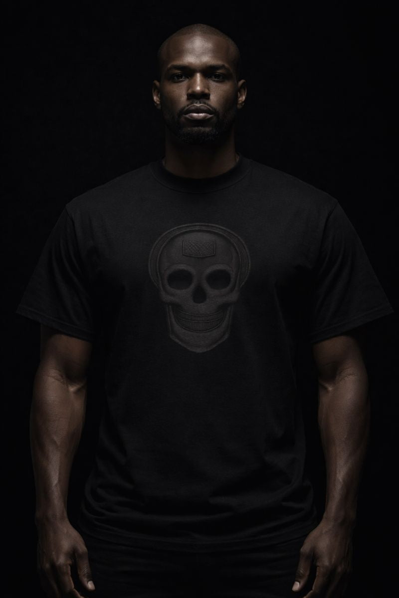 Luxury streetwear T-shirt featuring skull front graphic and dripped cross back design. PLAYAAS CULTURE® delivers bold symbolism, premium fit, and Blackpresure-driven identity.