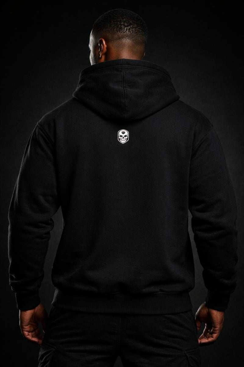 Strong Black male model wearing SENTINEL HOODIE front view on black luxury background