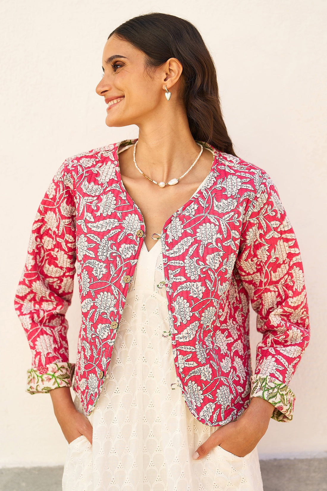 Yumi Pink Floral Reversible cotton quilted jacket with traditional quilting and unique inner print