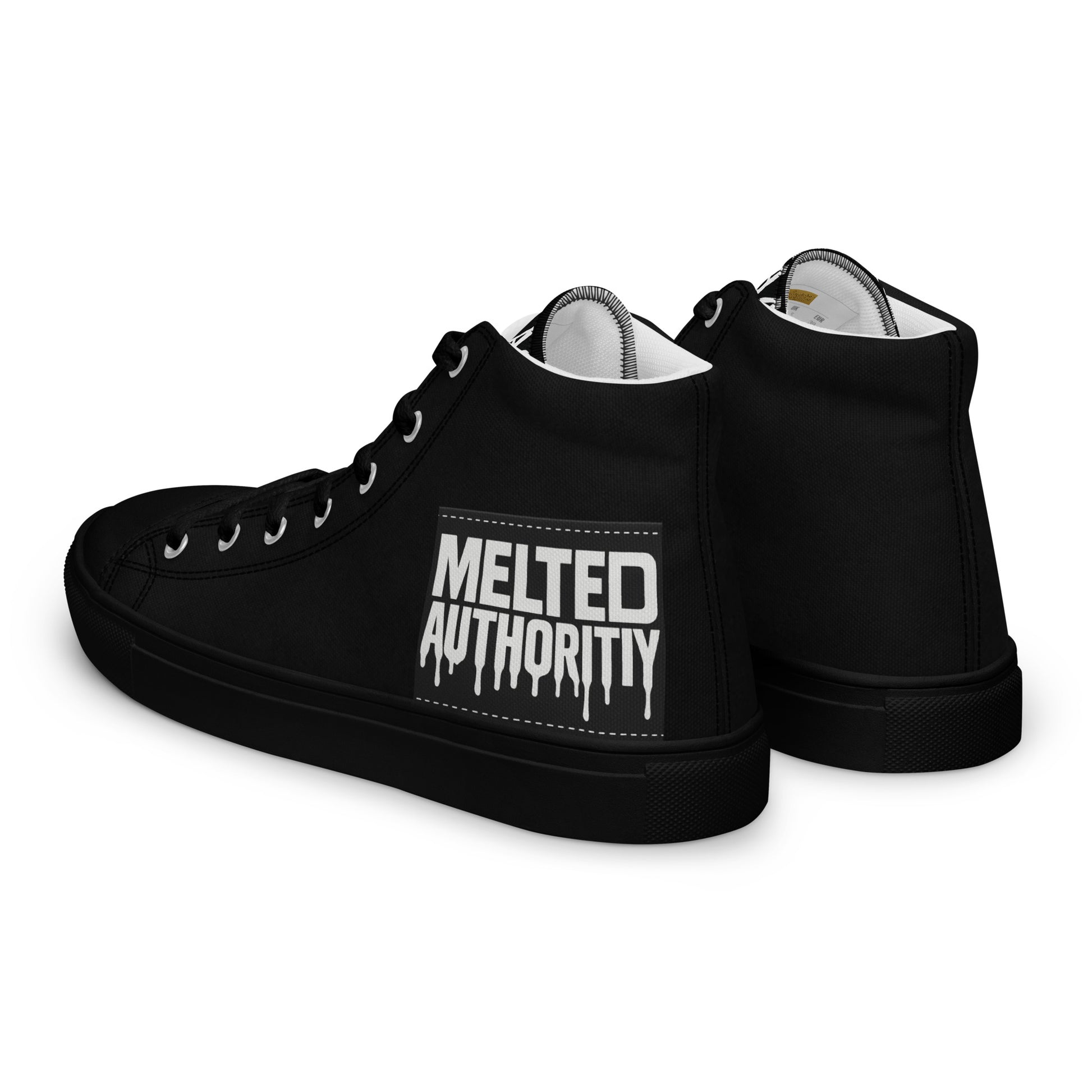 Black high-top canvas sneakers with “Melted Authority” graphic on outer heel, streetwear design rear angle.