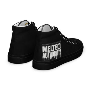 Top view of black high-top canvas sneakers with lace-up front and minimalist streetwear styling.