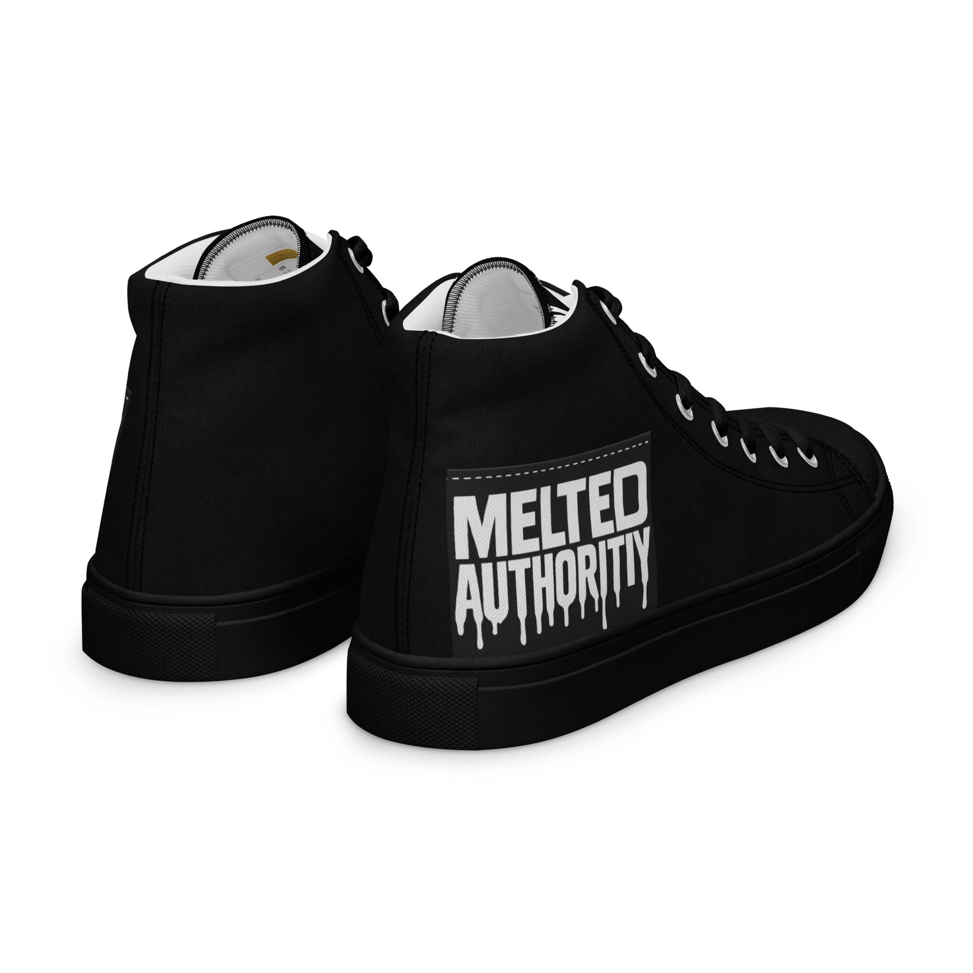 Top view of black high-top canvas sneakers with lace-up front and minimalist streetwear styling.