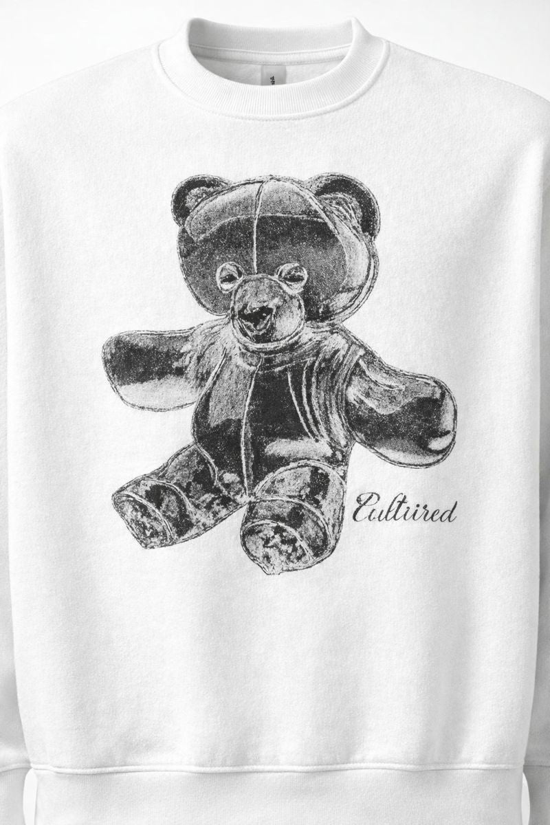 Close-up of teddy bear graphic on PLAYAAS CULTURE® Cultured oversized heavyweight sweatshirt.