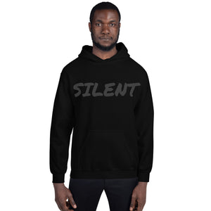 Black luxury streetwear hoodie by PLAYAAS CULTURE featuring tonal SILENT text on the front and a gold crown logo on the back, photographed in a minimal high-end studio setting.